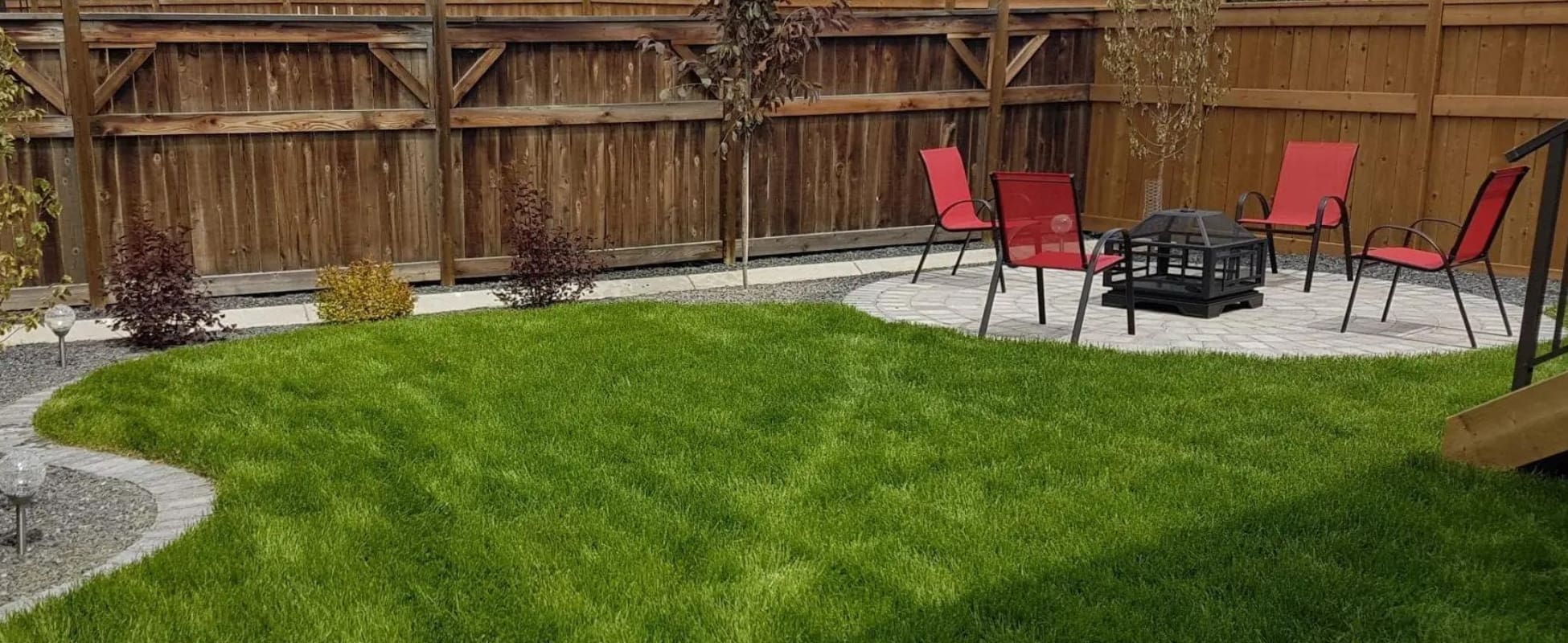 New Look Landscapes Top Rated Calgary Landscapers - Residential Calgary Landscaping - backyard garden, sod installation and paverstone patio area